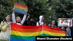 LGBT activists protest against amendments to the constitution in Moscow in  July  2020. The placard says, "I don't recognize the authority that keeps me from having a family."