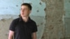 Russia - Tamerlan Toguzov, survivor of the Beslan school siege  - screen grab